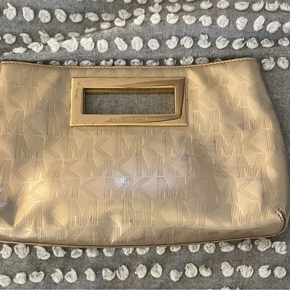 Michael Kors Handbags - Michael Kors shiny gold clutch